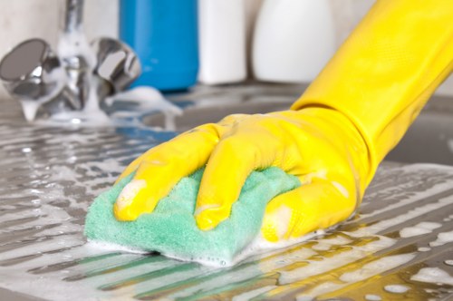 Cleaner polishing a bright home interior during one off cleaning