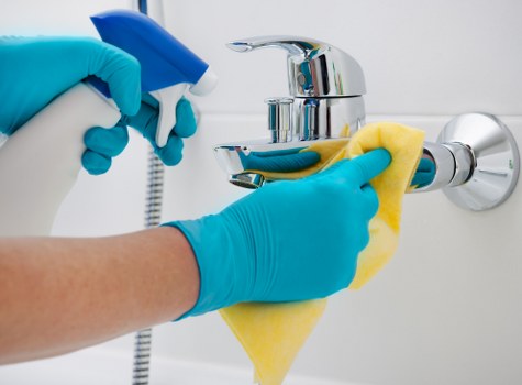 Kitchen deep cleaning with appliances and countertops